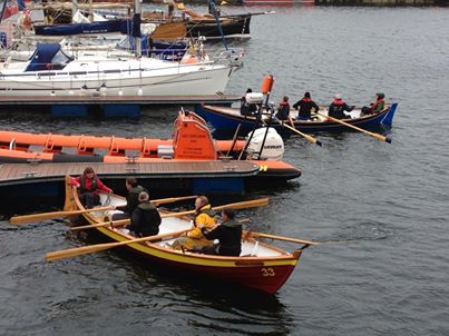 Coigach and Helmsdale skiffs arrive at pontoons